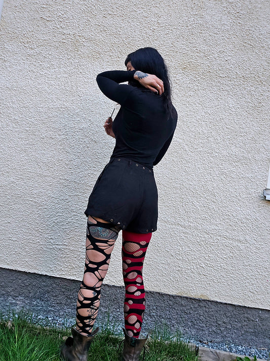 Black shorts with brass studs
