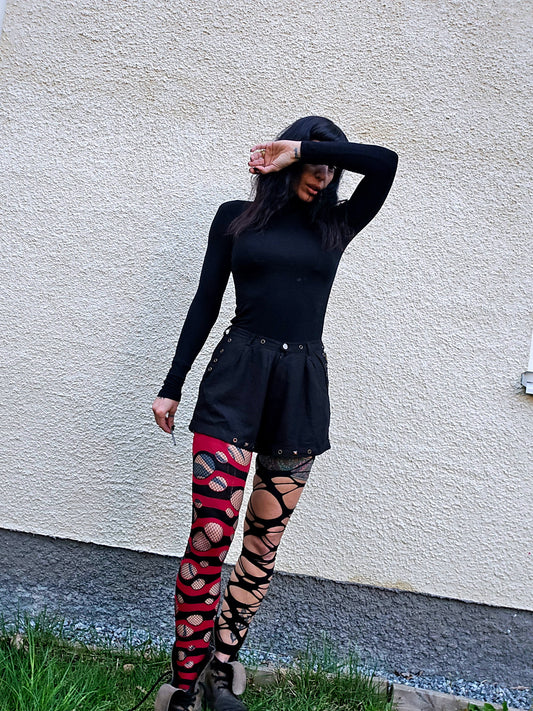 Black shorts with brass studs